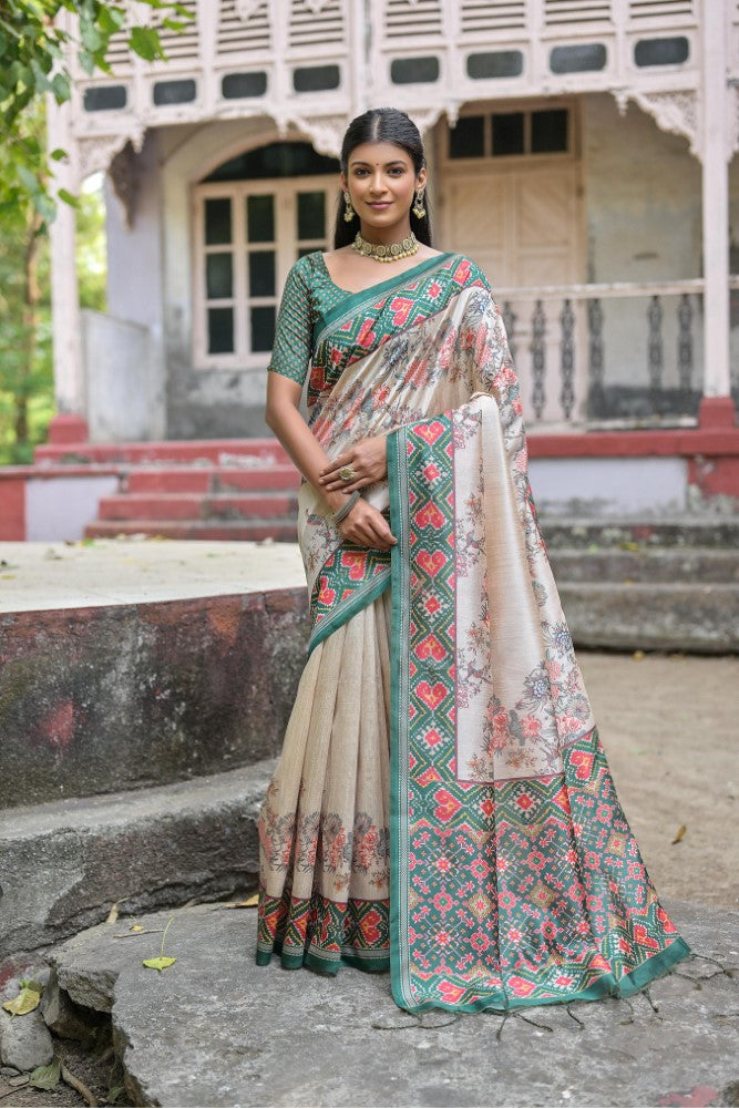 Soft tussar silk saree Patola print on pallu with floral print all over saree with contrast blouse