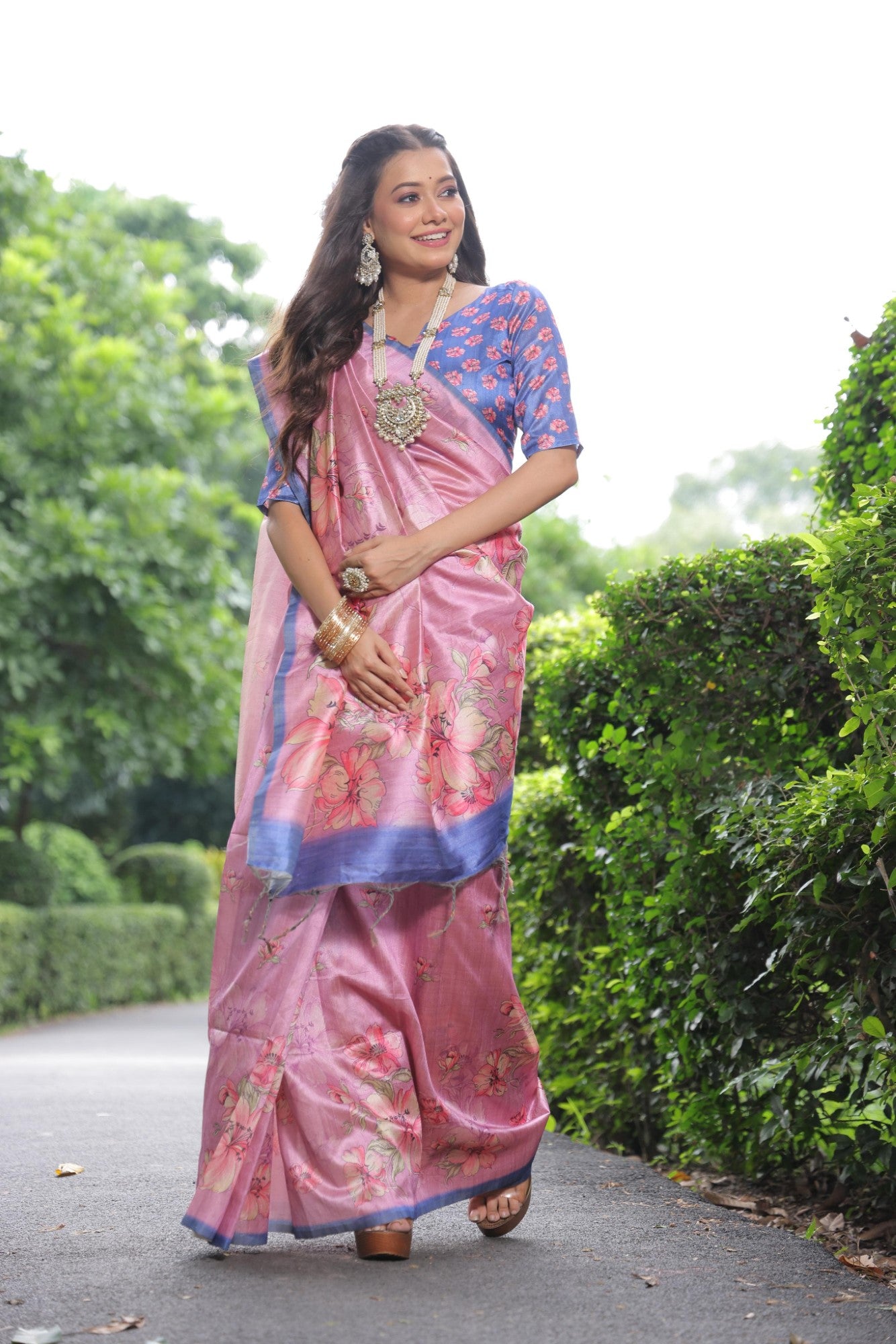 Soft tussar silk fabric with floral print pallu and printed border with flower butties work saree