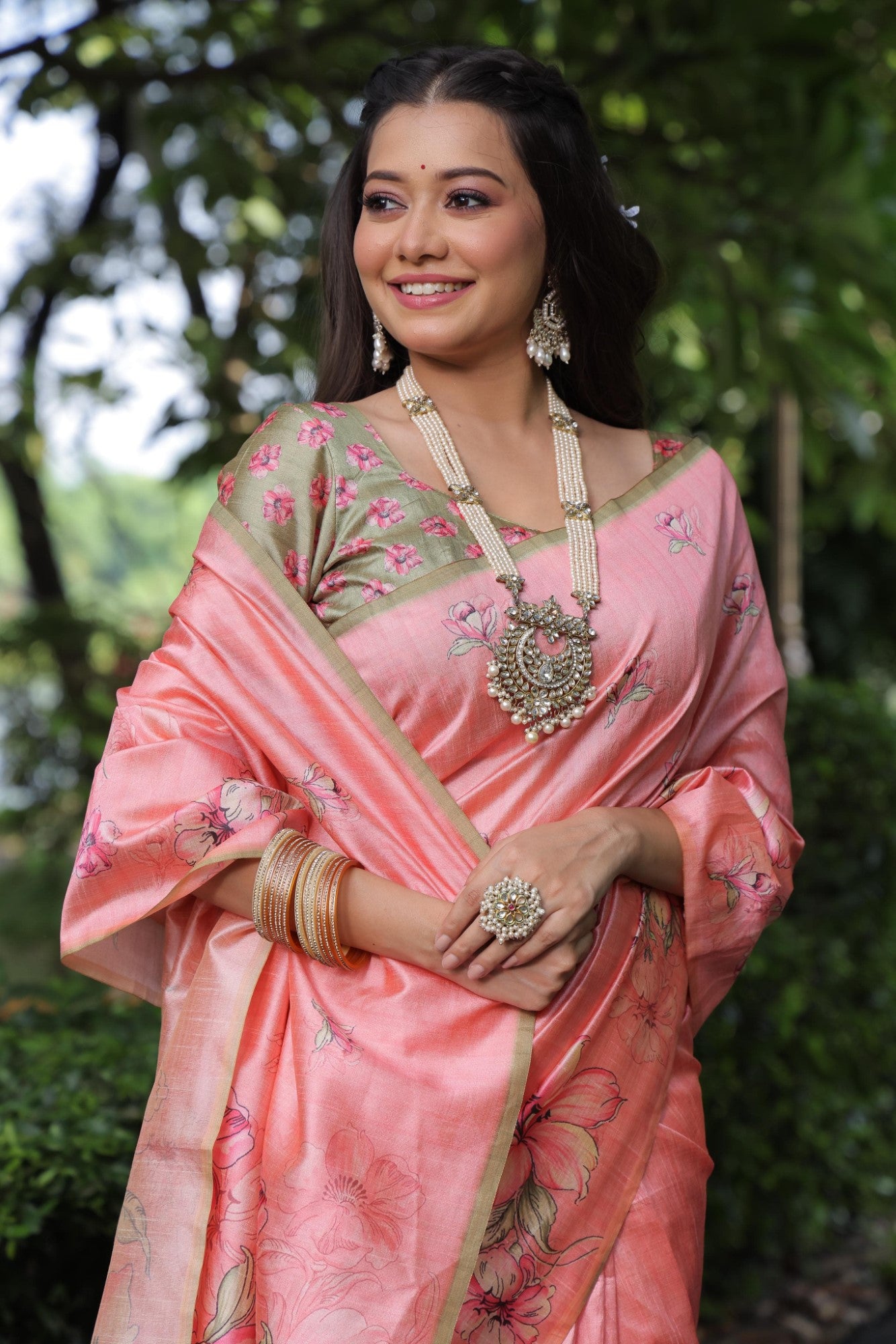 Soft tussar silk fabric with floral print pallu and printed border with flower butties work saree