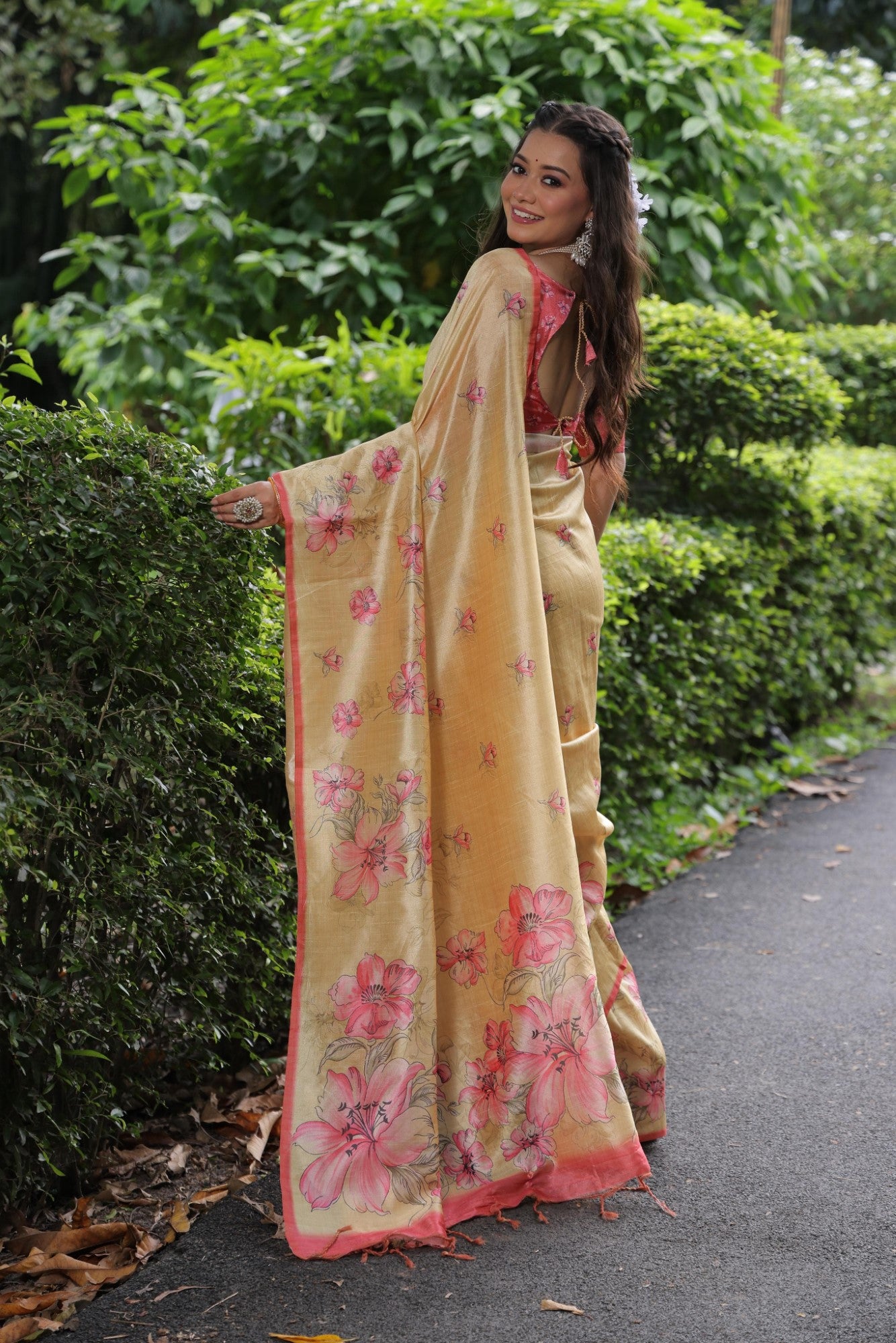 Soft tussar silk fabric with floral print pallu and printed border with flower butties work saree