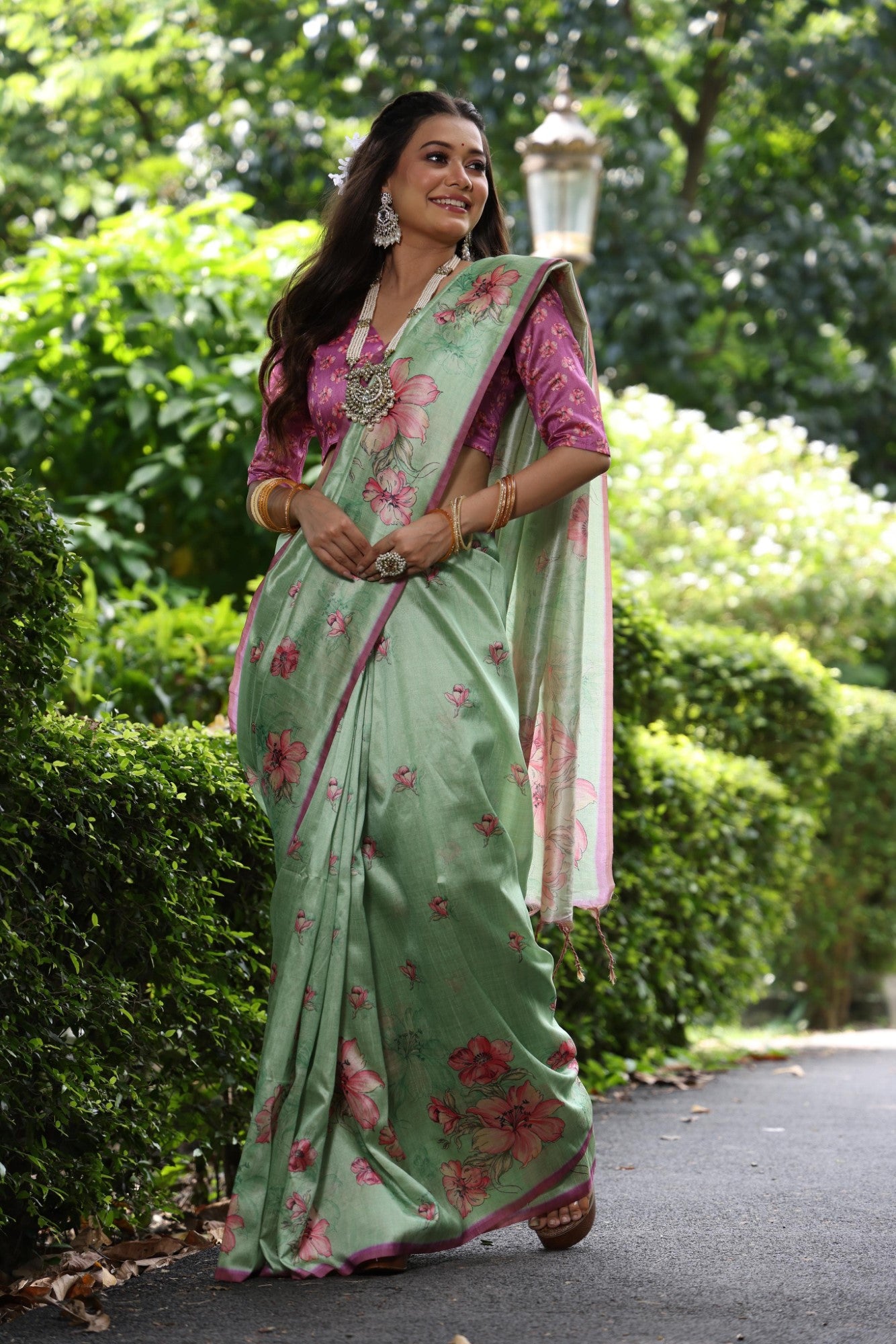 Soft tussar silk fabric with floral print pallu and printed border with flower butties work saree
