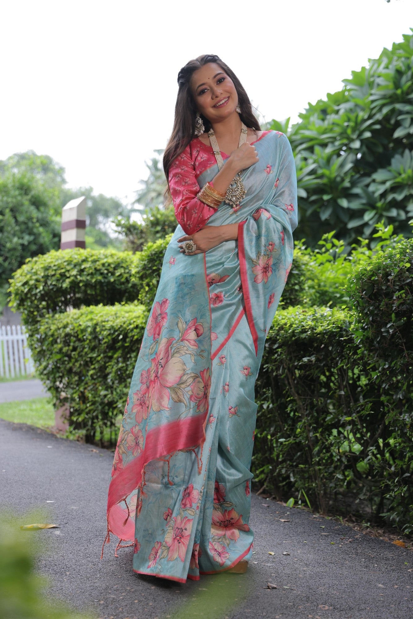 Soft tussar silk fabric with floral print pallu and printed border with flower butties work saree